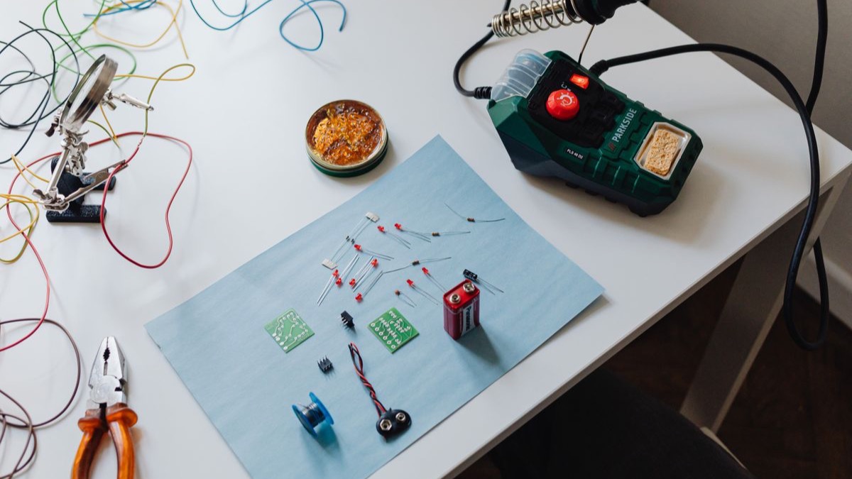 Loose electronic components and wiring laid out on a workbench